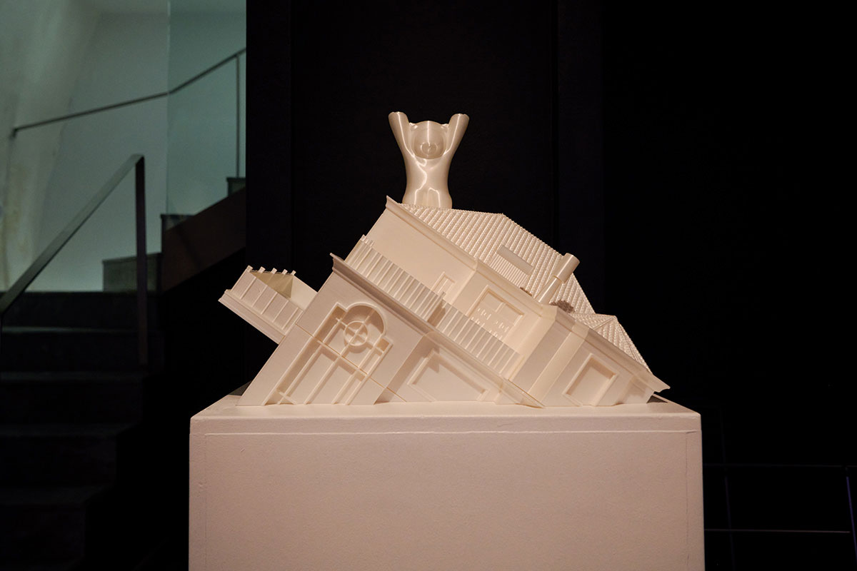 a-3D-printed-white-house-with-a-white-teddy-bear-made-by-Chun-Hua-Catherine-Dong